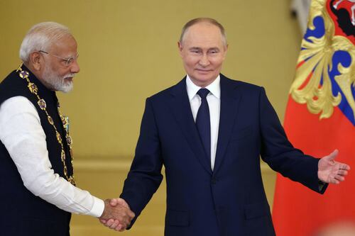 Ukraine condemns Indian leader for embracing Putin after deadly missile barrage