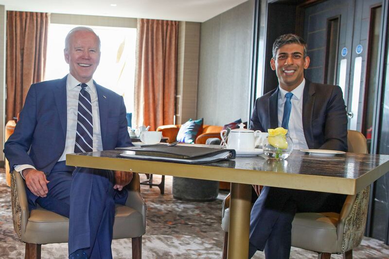 US president Joe Biden and UK prime minister Rishi Sunak pose for cameras during their Belfast hotel meeting. Photograph: Paul Faith/WPA Pool