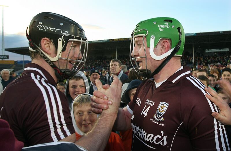 Galway's Tony Óg Regan and Joe Canning celebrate at the final whistle of the League Division 1 final in May 2010. Photograph: Cathal Noonan/Inpho