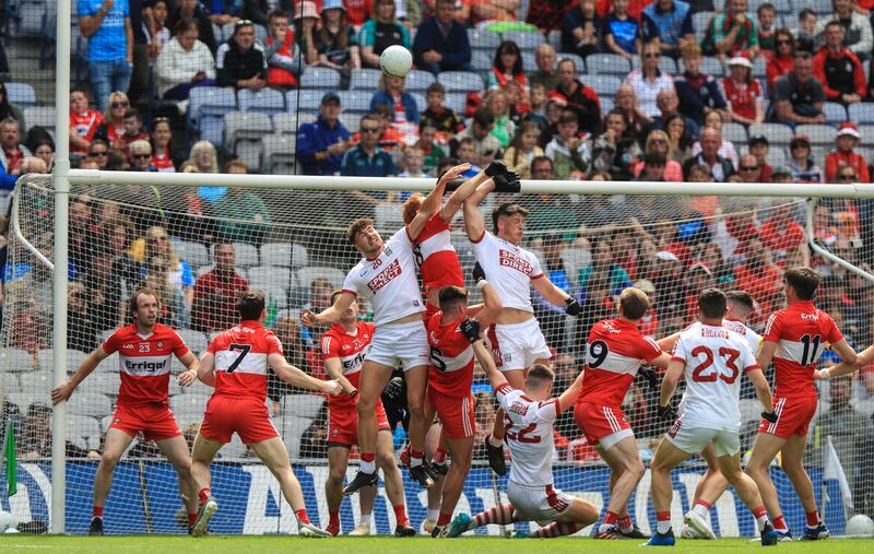 The tussle between Derry and Cork wasn't much of a spectacle. Photograph: Evan Treacy/Inpho