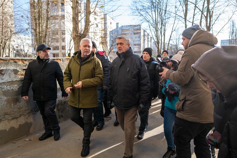 UN high commissioner for refugees Filippo Grandi (centre) tours a war-damaged neighbourhood of Kharkiv, Ukraine, with the city's mayor, Ihor Terekhov, on Tuesday. Photograph: Spencer Platt/Getty Images