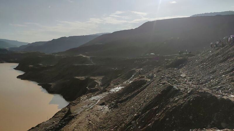 Rescuers said more than 30 miners who were digging for jade were swept into a lake by the landslide (AP)