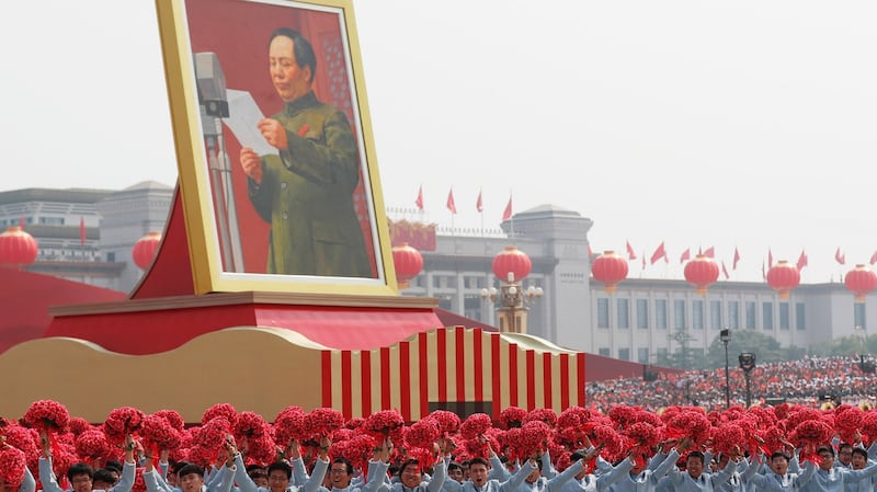 A float carrying a portrait of late Chinese leader and founder of the People’s Republic of China, chairman Mao Zedong, moves past Tiananmen Square during the military parade marking the 70th anniversary of the founding of the People’s Republic of China. Photograph: Wu Hong/EPA