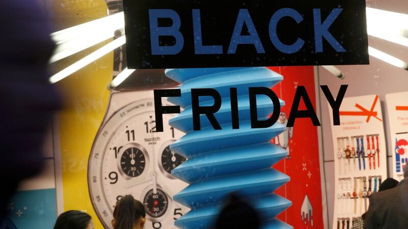 A sign promoting “Black Friday” in the window of a shop in Oxford Street, London. Photograph: Peter Nicholls/Reuters