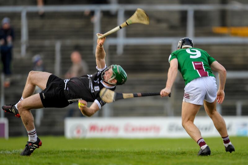 Galway's Éanna Murphy is fouled by Cormac Boyle of Westmeath. Photograph: Tommy Grealy/Inpho