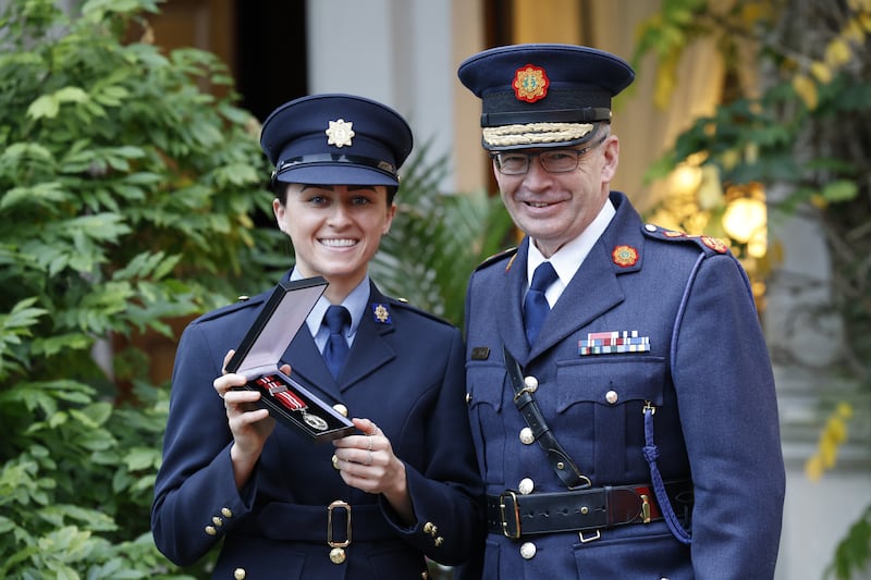 Garda Sarah Lynam (Silver Medal and Certificate of Bravery) with Garda Commissioner Drew Harris following the presentations. Photograph: Nick Bradshaw