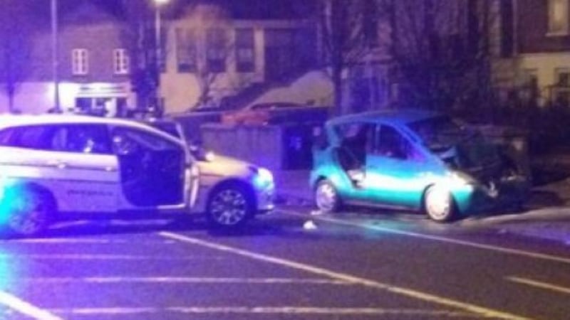 A Garda car and a crashed vehicle in Ranelagh last night where a stolen van collided with five vehicles. Photograph: @StephenMcBrien via Twitter