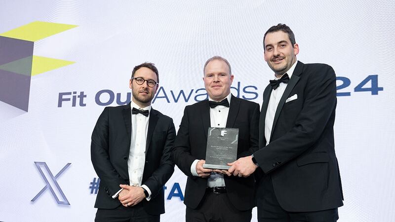 Gareth Sherry, manager of Irish Wood Interiors Network, presents the fit out project of the year - conservation award to Derek Fortune and Neil McCormick, MCA Architect and OPW