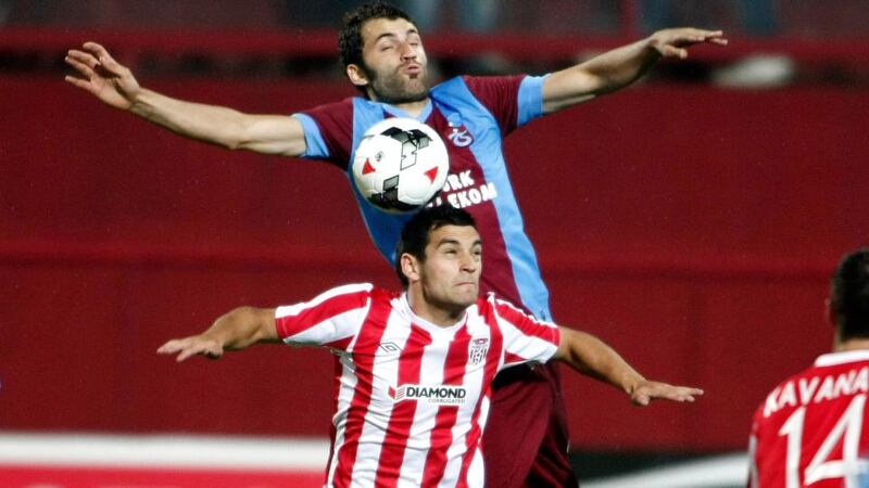 Derry’s Michael Duffy and Ondrej Celustka of Trabzonspor contest a high ball. Photograph: Aykut Akici/Inpho