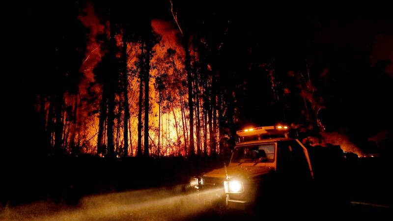 Fire crews monitor fires and begin back burns between the towns of Orbost and Lakes Entrance in east Gipplsland on January 2nd, 2020 in Australia. Photograph: Traynor/Getty Images