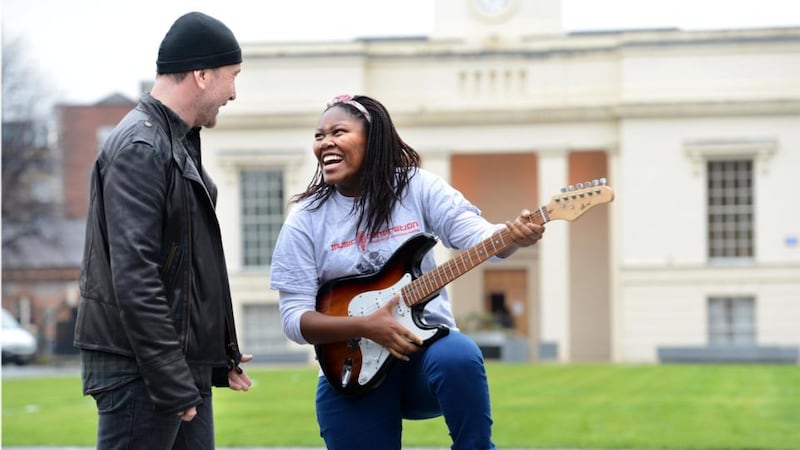 The Edge with Kgomotso Ngwenya, from Music Generation Laois in January 2013. Photograph: Dara Mac Dónaill/The Irish Times