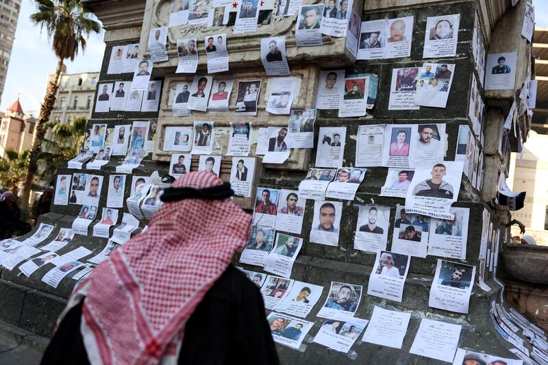 Photographs of missing people on a monument in al-Marjeh Square in Damascus on Monday, December 16th, as Syrians continue to search for their relatives following the overthrow of Syrian president Bashar al-Assad. Photograph: EPA/EFE