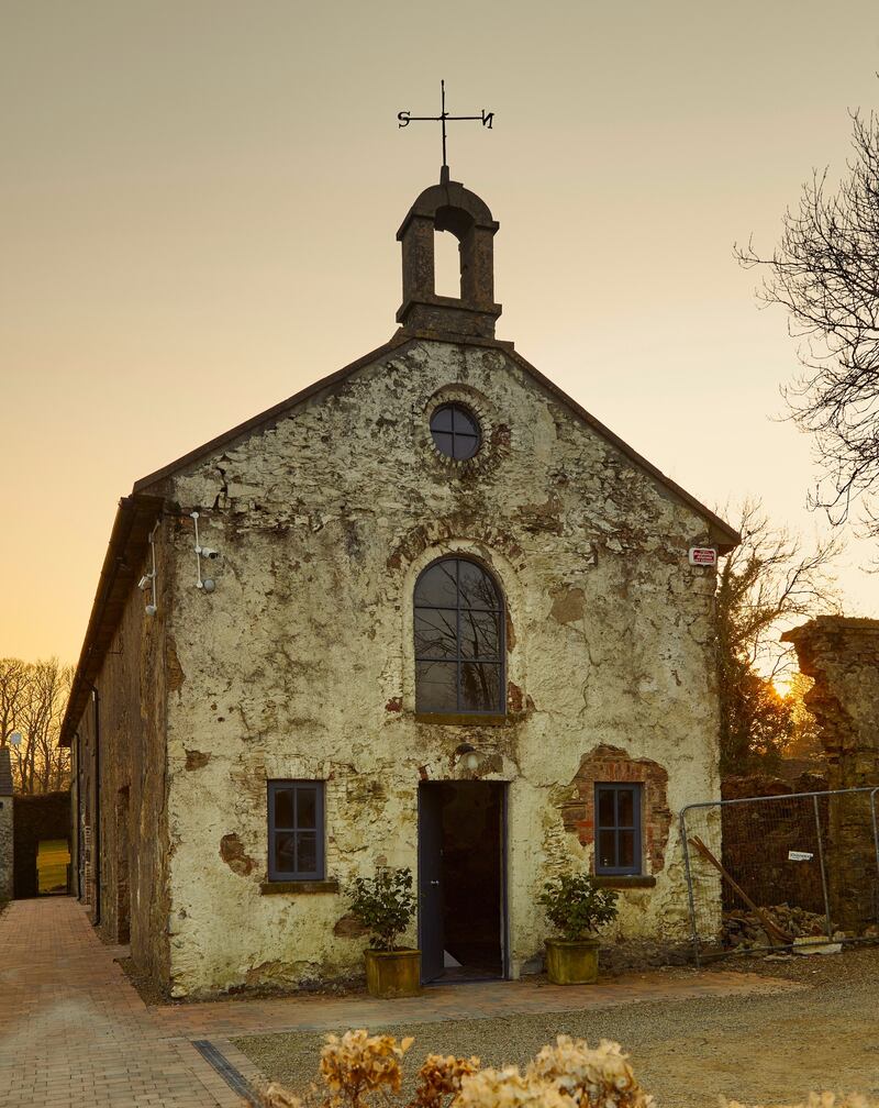 The coach house’s front elevation looks similar to the original apart from newly-installed windows and door