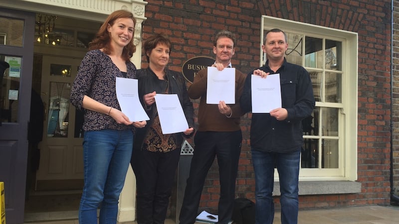 Kate Ruddock of  Friends of the Earth, Attracta Uí Bhroin of An Taisce, Scott Coombs of Love Leitrim and Richard Boyd Barrett TD   with copies of  the Prohibition of Hydraulic Fracturing Bill 2015. Photograph: Harry McGee /The Irish Times