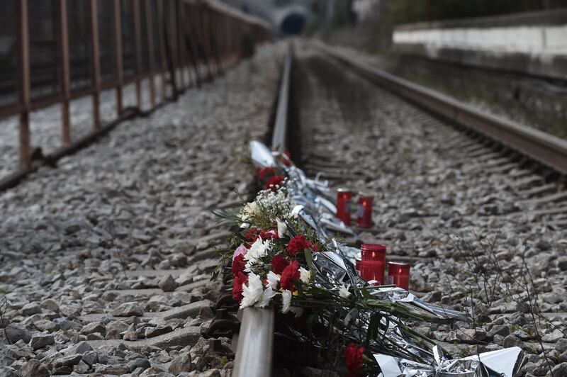 Flowers placed on the tracks at the railway station of Rapsani, Greece, on March 5th during a commemorative gathering for the victims of a deadly train crash which killed 57. Photograph: Sakis Mitrolidis/AFP via Getty