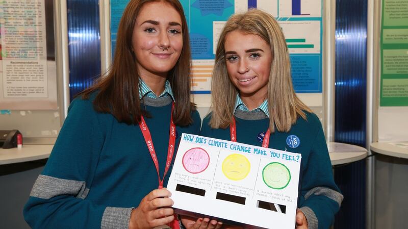 Una Rainsford (left) and Rachel Murtagh from Colaiste Choilm in Cork with their project ‘Is Climate Chane Affecting Mental Health’ . Photograph: Laura Hutton