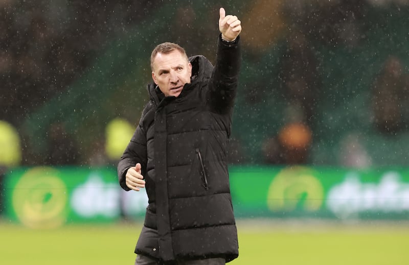 Brendan Rodgers gestures to what was left of the home crowd following Celtic's win over Livingston. Photograph: Steve Welsh/PA Wire