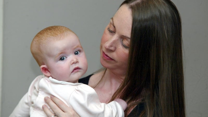 Julie O’ Donoghue with her five-month-old daughter Ailbhe at the meeting of the Yes campaign on the Eighth Amendment in the Percy French hotel in Strokestown, Co Roscommon last Friday night. Photograph: Paul Molloy