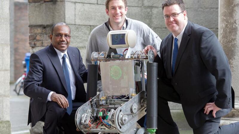 Robbie the Robot, an assistance robot for those born without limbs, with Dr Hamadoun I. Touré of the UN and TCD’s Conor McGinn and Kevin Kelly