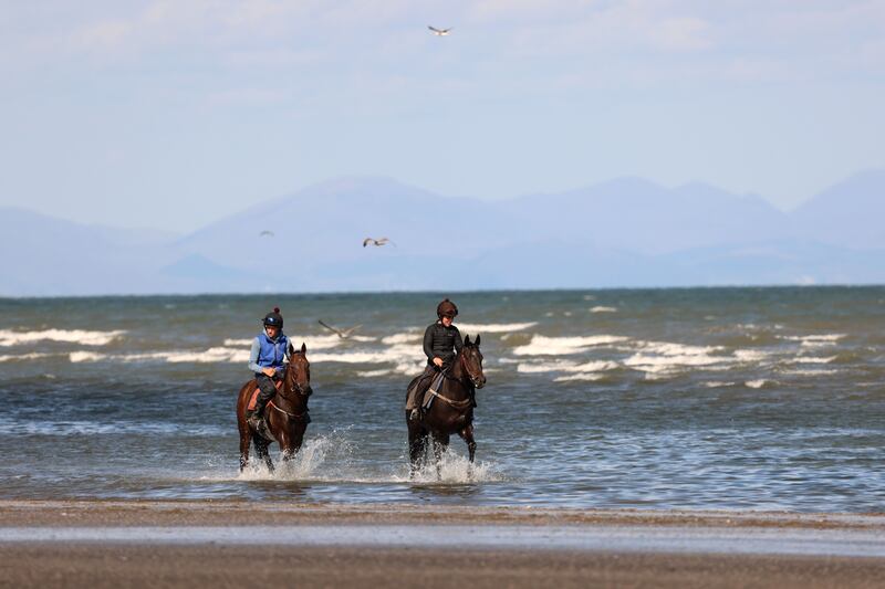 A pair of jockeys prepare for the Laytown Races on Laytown Beach in Co Meath. Photograph: Dara Mac Dónaill/The Irish Times