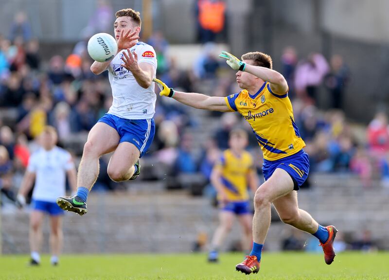 Monaghan's Michael Bannigan and Niall Daly of Roscommon compete for possession. Photograph: James Crombie/Inpho