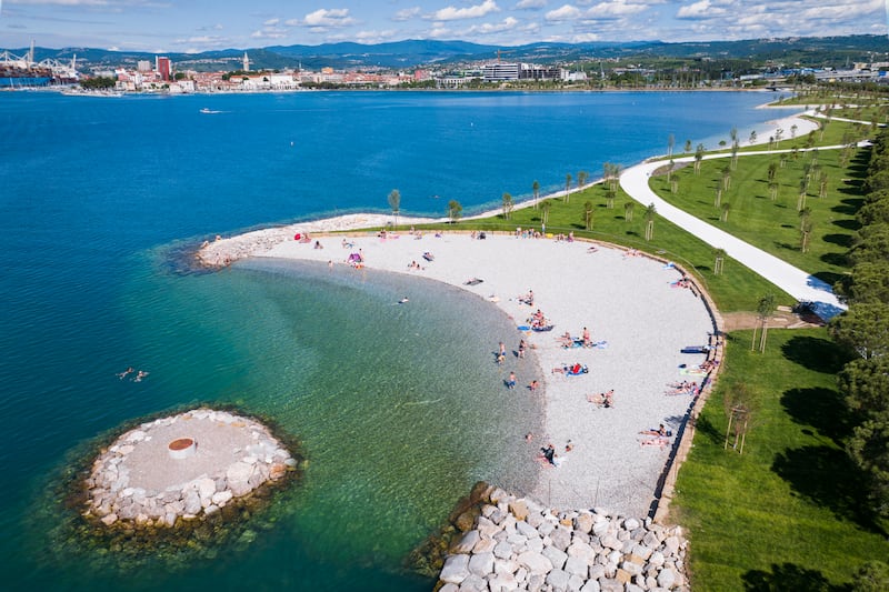 The EuroVelo 8 Mediterranean Route in Slovenia takes in beaches perfect for a rest stop and refreshing dip. Photograph: Jaka Ivancic