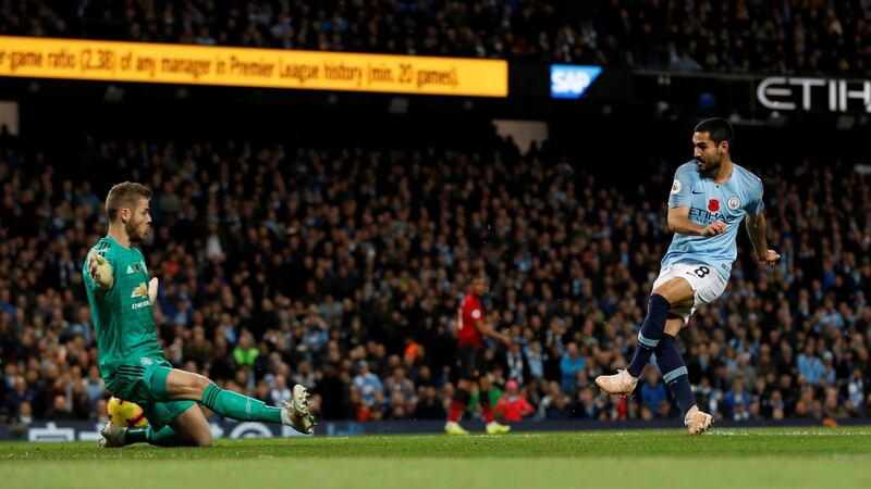 Manchester City’s Ilkay Gundogan scores their third goal in the Premier League match against Manchester United at the Etihad stadium  . Photograph: Darren Staples/Reuters