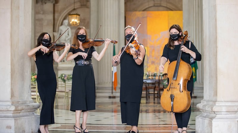 Live music: Bow Musique (L-R) Siofra Grant, Sandra Mason, Aoife Durnin and Mary Barnecutt play at the wedding of Elaine Anderson and Joe Czucha at City Hall, Dublin. Photograph: Tom Honan