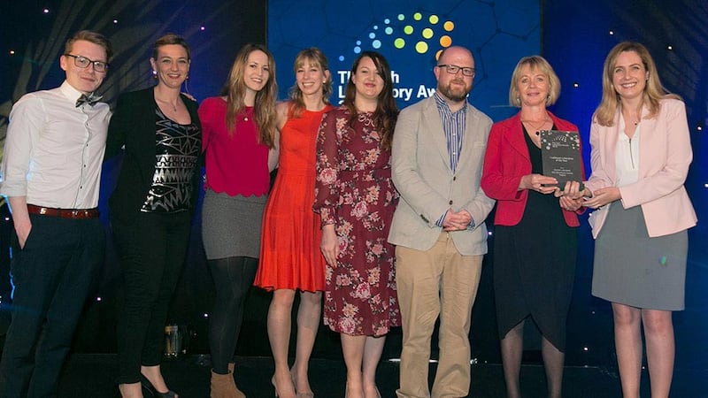 Dr. Fiona Blighe, Scientific Programme Manager, Science Foundation Ireland, presents the Healthcare Laboratory of the Year award to Stanton Laboratory, Teagasc team.