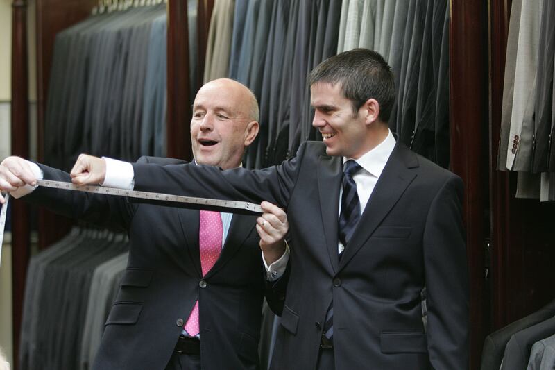 Super-bantamweight world champion Bernard Dunne being measured by Louis Copeland in 2009. Photograph: Alan Betson