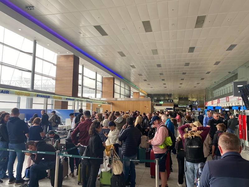 Queues in Dublin Airport on Tuesday amid cancelled flights and disruption following an UK air traffic fault on Monday. Photograph: Fiachra Gallagher