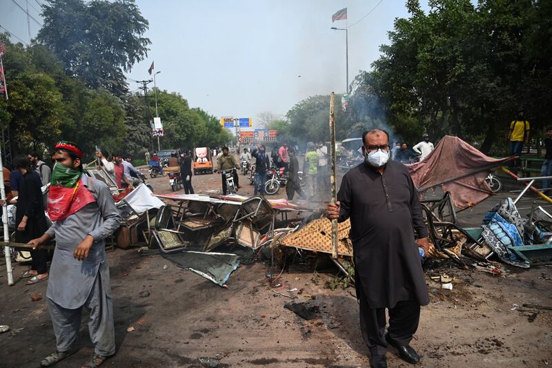 Supporters of Imran Khan during the clashes with police on Wednesday. Photograph: Aamir Qureshi/AFP/Getty Images