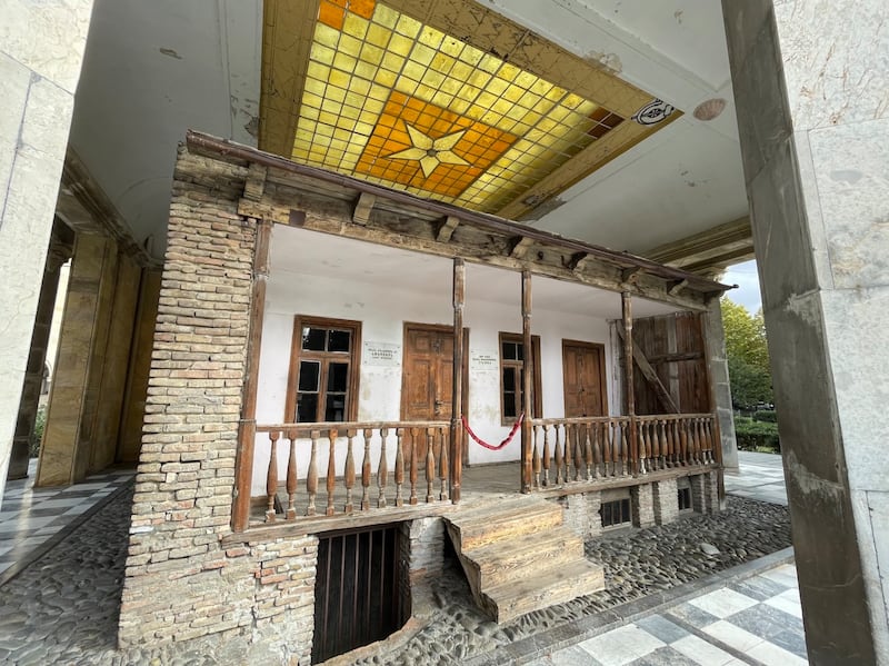 The preserved peasant house in the Georgian town of Gori where Soviet dictator Josef Stalin was born in 1878. The son of a cobbler, his real surname was Dzhugashvili; he took the pseudonym Stalin from the Russian word for 'steel'. By Daniel McLaughlin