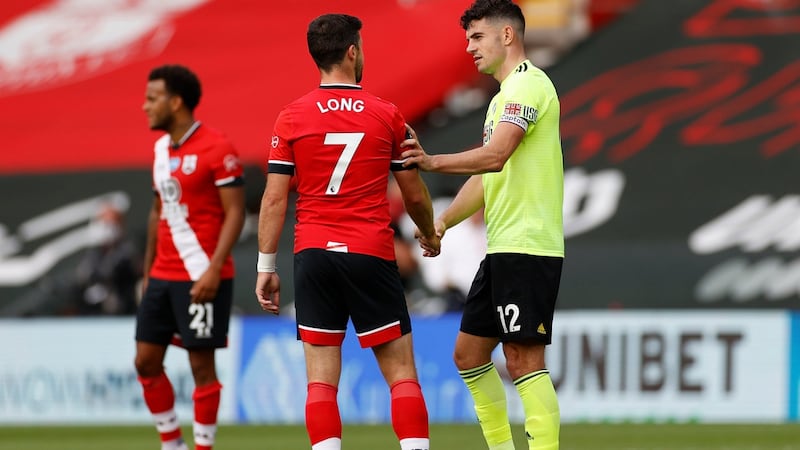 Shane Long of Southampton talks to fellow Ireland international  John Egan of Sheffield United following the Premier League match  at St Mary’s on Sunday. Photograph:  Andrew Boyers/Pool via Getty Images