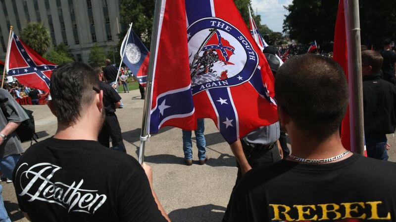 Ku Klux Klan members take part in a Klan demonstration at the state house building on July 18, 2015 in Columbia, South Carolina. Photograph: John Moore/Getty Images