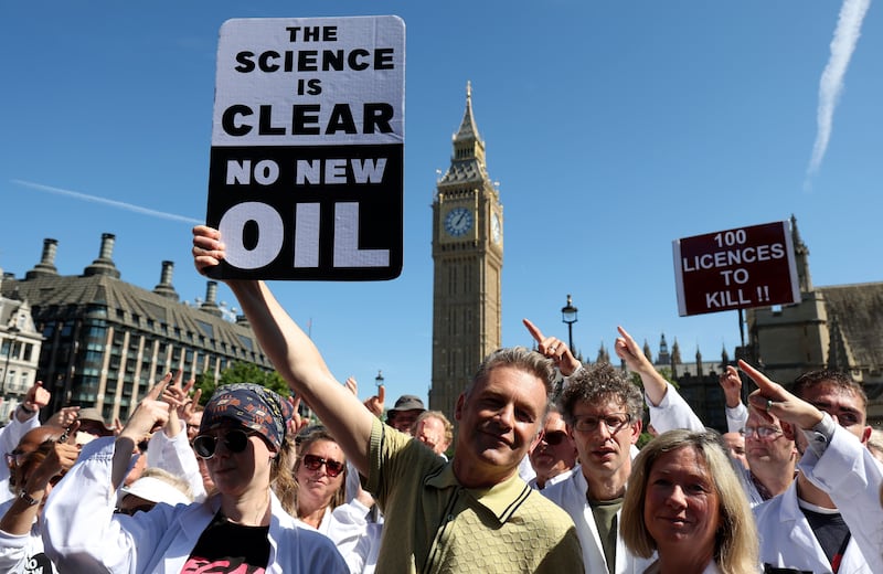 Chris Packham at a protest outside the houses of parliament in London in September 2023 calling for the British government not to support any new gas and oil developments. Photograph: Andy Rain/EPA