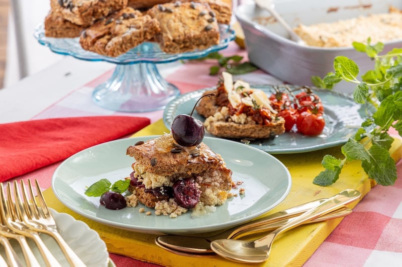 These spelt scones, are a nutrient-dense take on the traditional scone and can be served with savoury or sweet toppings. The baked cottage cheese is to the rear of shot