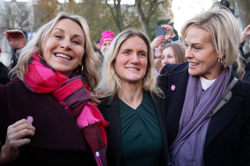 Labour MP Kim Leadbeater (centre) is joined by campaigner and cancer sufferer Sophie Blake (left) and Rebecca Wilcox, daughter of Esther Rantzen (far right), after hearing the result of the vote in parliament for her Terminally Ill Adults (End of Life) Bill in Westminster. Photograph: Stefan Rousseau/PA Wire