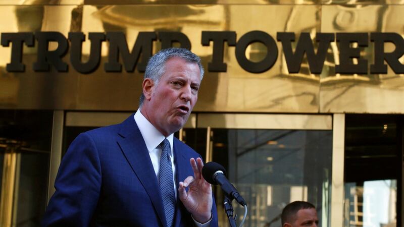 New York City mayor Bill de Blasio: tells reporters  he let Donald Trump know that many New Yorkers are fearful of  his future policies. Photograph: Brendan McDermid/Reuters