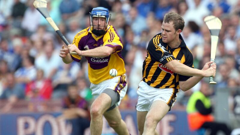 Wexford’s Diarmuid Lyng  in action against  Tommy Walsh of Kilkenny during the Leinster Hurling Final in 2007. Photograph: Lorraine O’Sullivan/Inpho