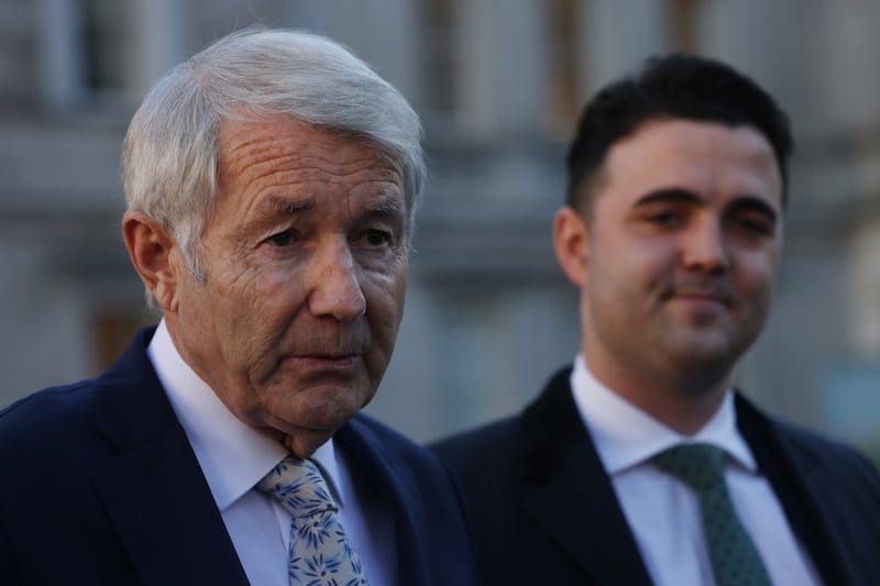 Michael Lowry and Barry Heneghan answering questions at a doorstep at Leinster House on January 15th. Lowry has told reporters that the Regional Independent Group are “a team” and are “in this for five years”. Photograph: Bryan O’Brien / The Irish Times