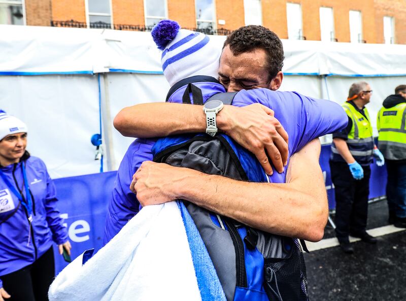 Martin Hoare celebrates with race director Jim Aughney. Photograph: Nick Elliott/Inpho