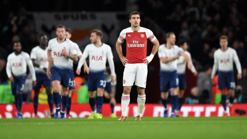 Sokratis Papastathopoulos of Arsenal  after Tottenham’s second goal. Photograph: Shaun Botterill/Getty Images