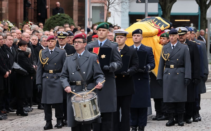 The coffin of Wolfgang Schäuble is taken to the tomb by soldiers of the German armed forces Bundeswehr in Offenburg, Germany on Friday. Photograph: Daniel Roland/AFP via Getty Images