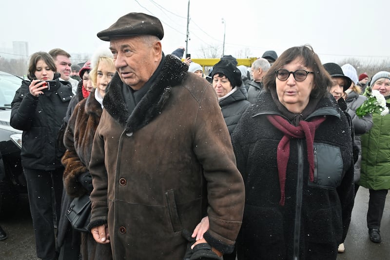 Anatoly Navalny and Lyudmila Navalnaya parents of late Russian opposition leader Alexei Navalny, arrive to pay tribute to their son at his grave at the Borisovo cemetery in Moscow. Photograph: Alexander Nemenov/AFP/ via Getty Images         