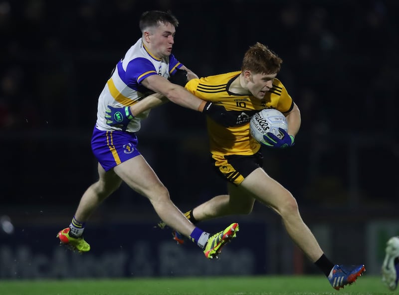 Errigal Ciarán's Ruairí Canavan tackles Ciaran Moore of St Eunan's at Healy Park. Photograph: Leah Scholes/Inpho

