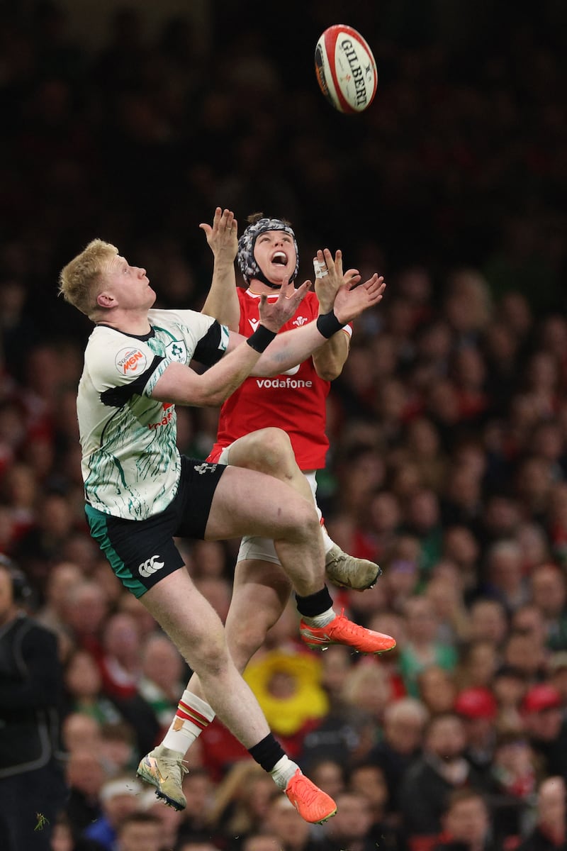 Ireland's Jamie Osborne and Wales's Tom Rogers contest a high ball during the Six Nations in Cardiff. Photograph: Adrian Dennis/AFP