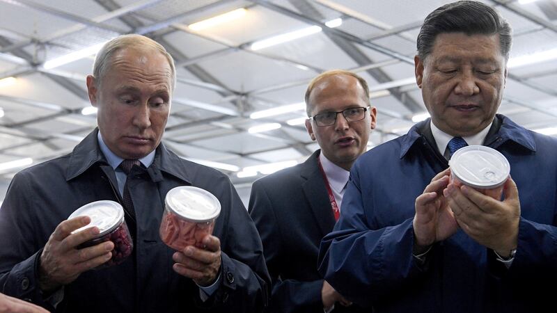 Russian President Vladimir Putin (left) with his Chinese counterpart Xi Jinping inspecting freeze dried fruits and vegetables while visiting the Eastern Economic Forum in Vladivostok, Russia on September 11th  Photograph: EPA/Kirill Kudryavtsev