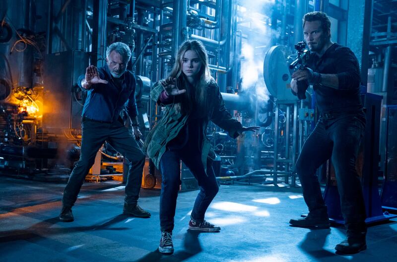 Alan Grant (Sam Neill), Maisie Lockwood (Isabella Sermon) and Owen Grady (Chris Pratt) in Jurassic World Dominion