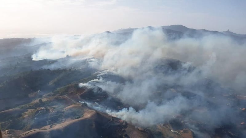 Smoke rises from a forest fire in Gran Canaria, Spain on Monday. Photograph: BRIF handout/EPA